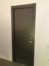 puerta corredera oculta nogal oscuro lisa